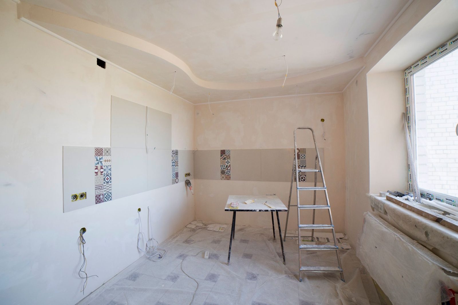 A Teesside kitchen mid-renovation, stripped back ready for new units